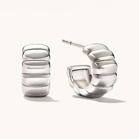 18K gold-plated, solid sterling silver C-shaped hoop earrings.