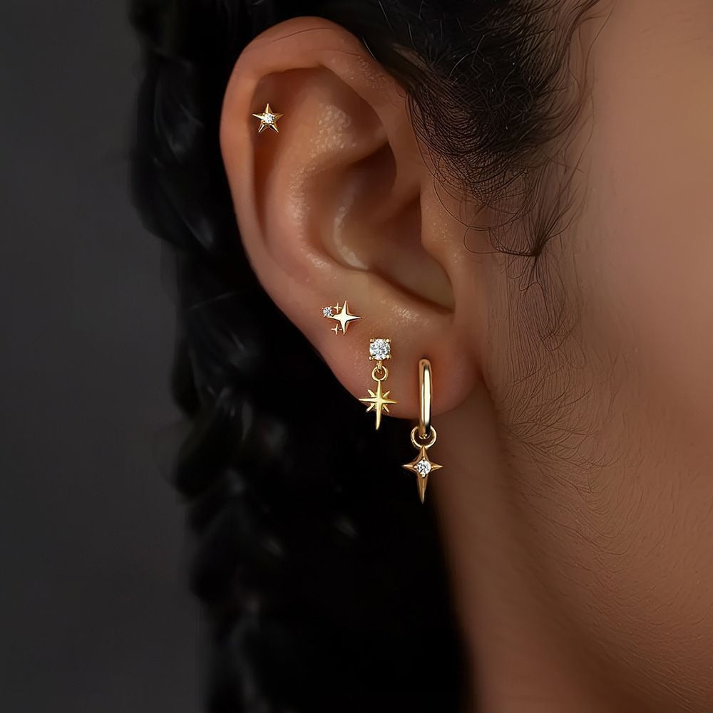 S925 silver starburst stud earrings with diamonds.