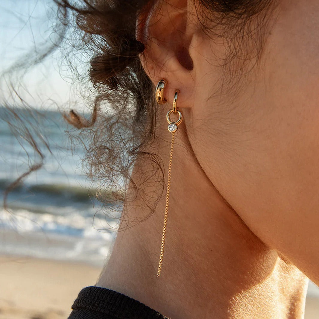 18K gold lightweight luxury tassel earrings with cubic zirconia.