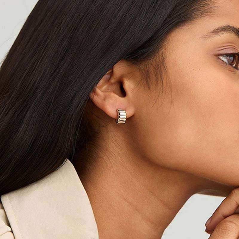 18K gold-plated, solid sterling silver C-shaped hoop earrings.
