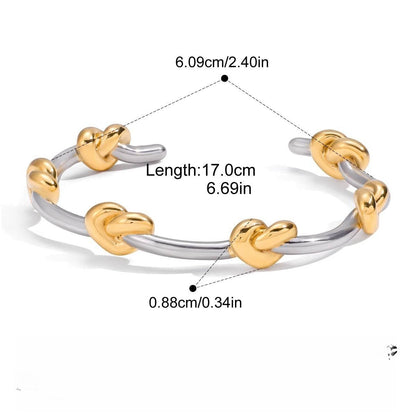 18K gold-plated, lightweight, and luxurious two-tone titanium steel bracelet.