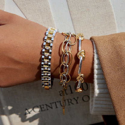 18K gold-plated, lightweight, and luxurious two-tone titanium steel bracelet.