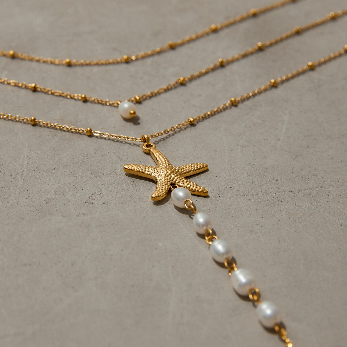 18K gold multi-layer chain with starfish and pearl tassel design exquisite and noble necklace