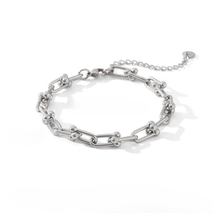 18k gold horseshoe chain bracelet and earrings