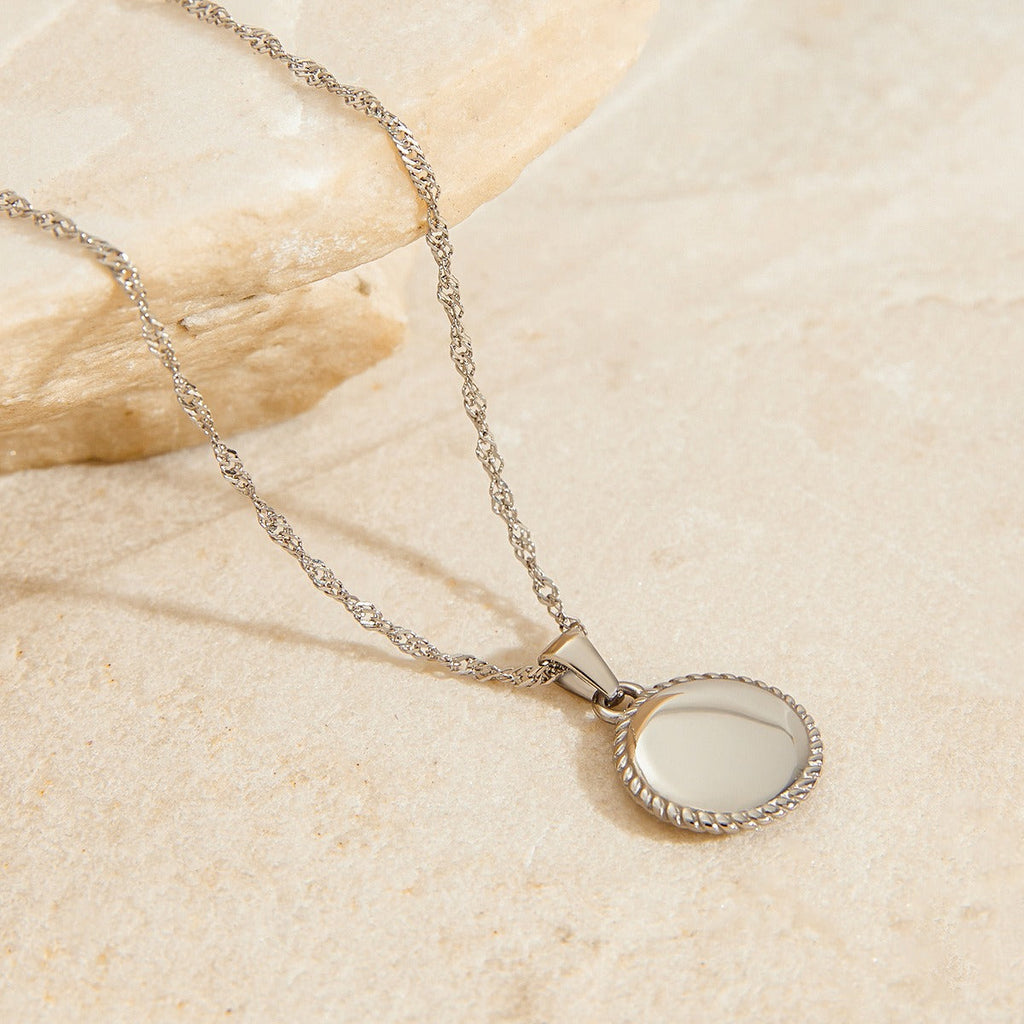 Round necklace with angel pattern design, classic and fashionable