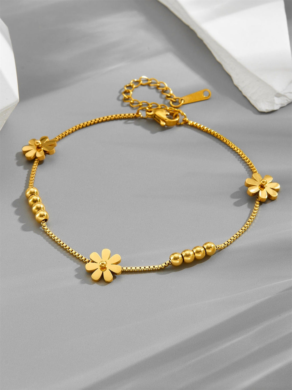 18k gold small daisy bean luck bead bracelet