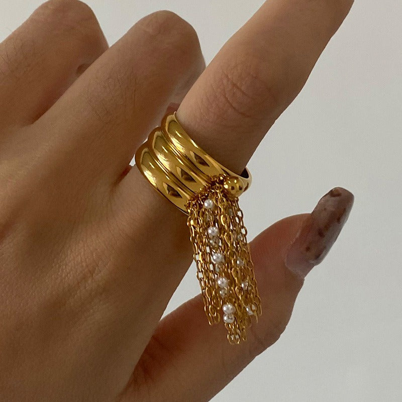 18K gold multi-layered ring with tassel design