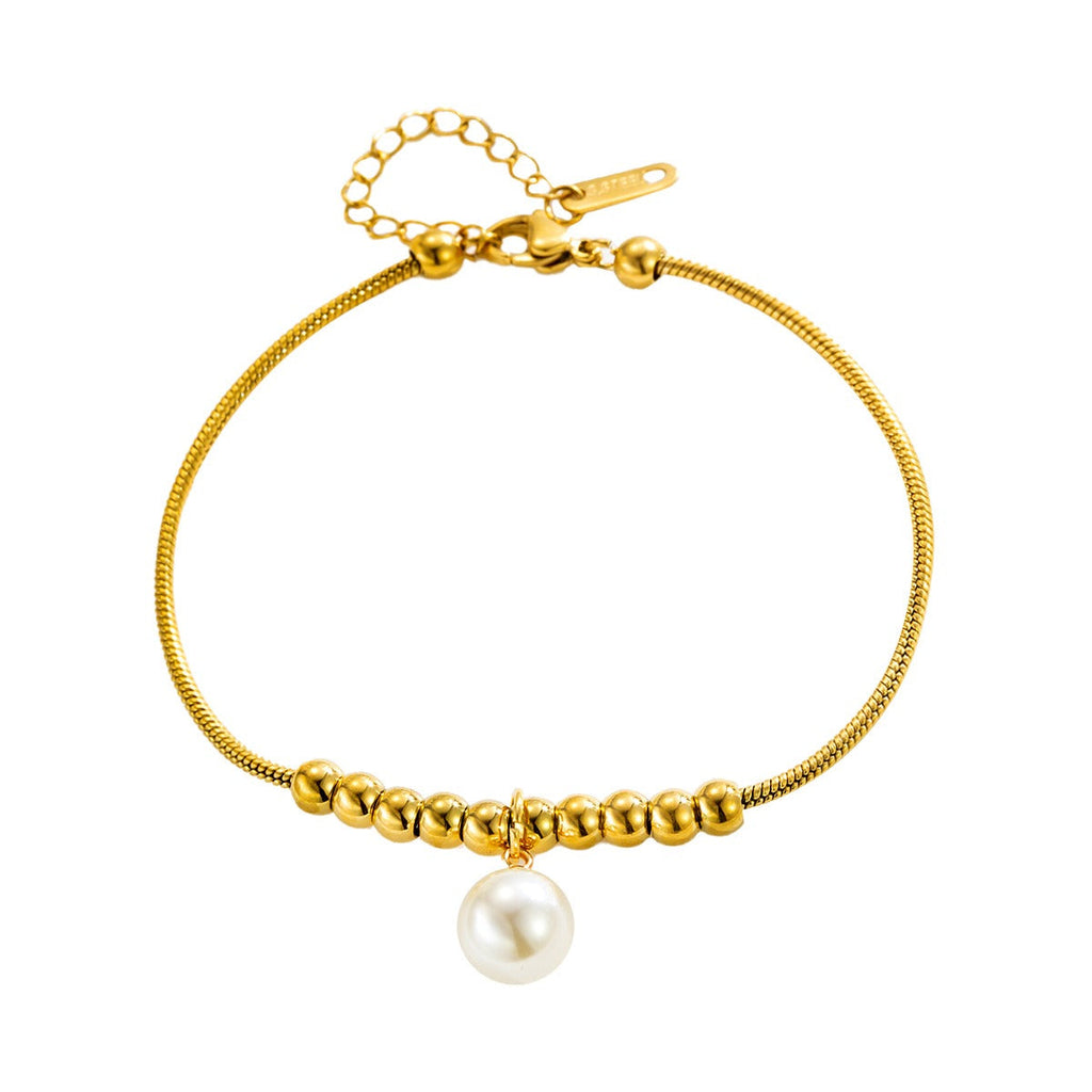 18k gold snake bone beaded anklet with a large heart-shaped heart
