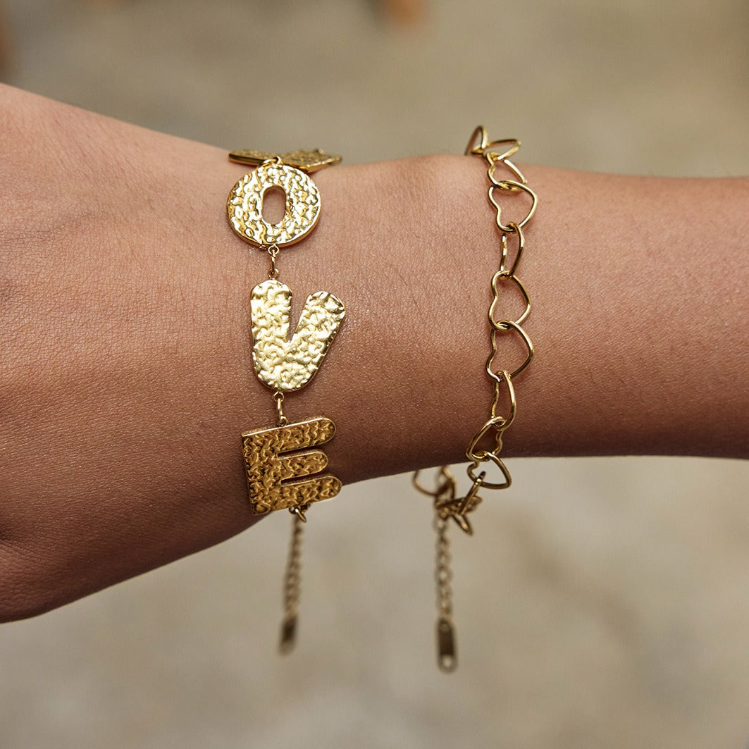 18K gold-plated, lightweight, and luxurious titanium steel bracelet with letter design.
