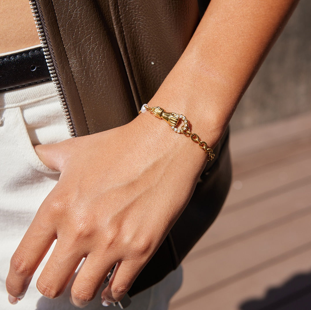 18K gold-plated, lightweight, and luxurious titanium steel bracelet.