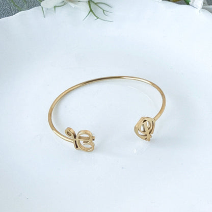18K gold open-design smooth bangle bracelet