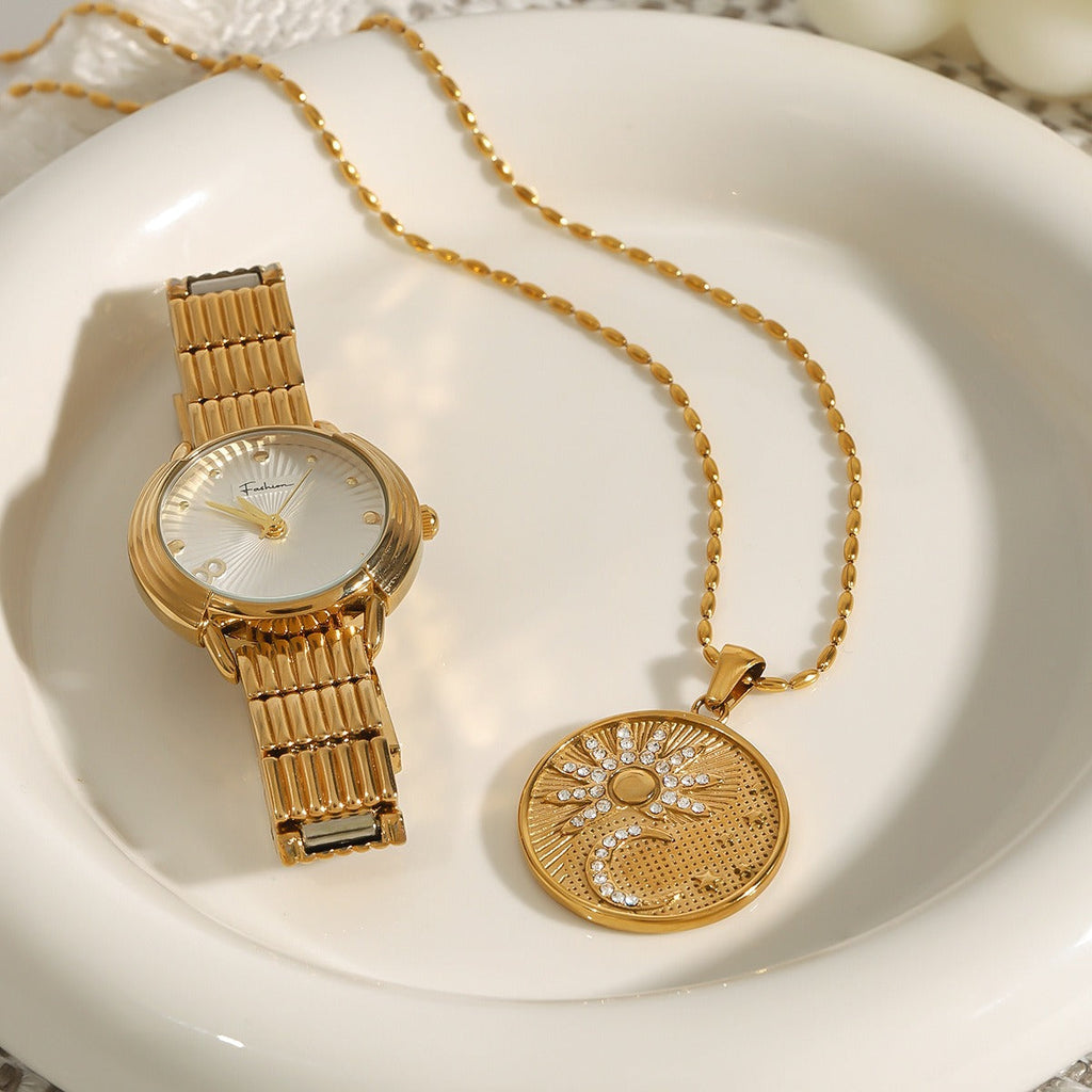18K gold round necklace with sun and moon pattern and diamond design