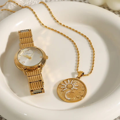 18K gold round necklace with sun and moon pattern and diamond design