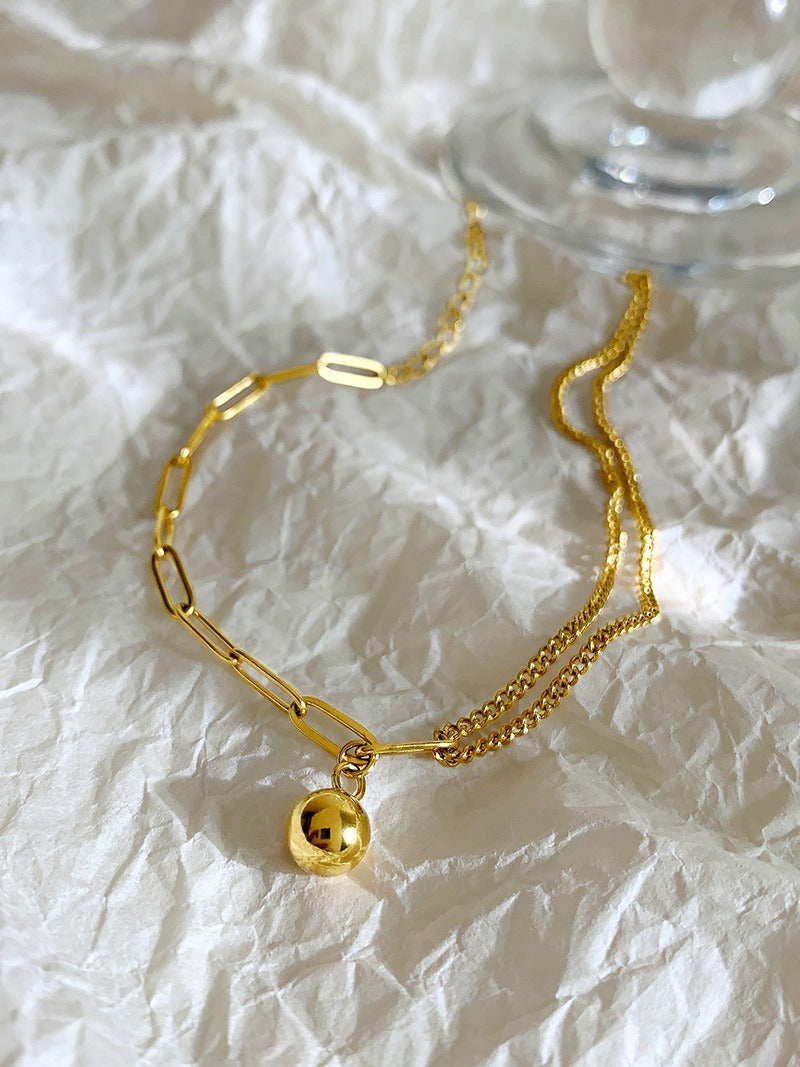 Light luxury 18k gold small gold ball titanium steel anklet