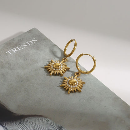 18k gold sun-shaped diamond-studded earrings with unique design