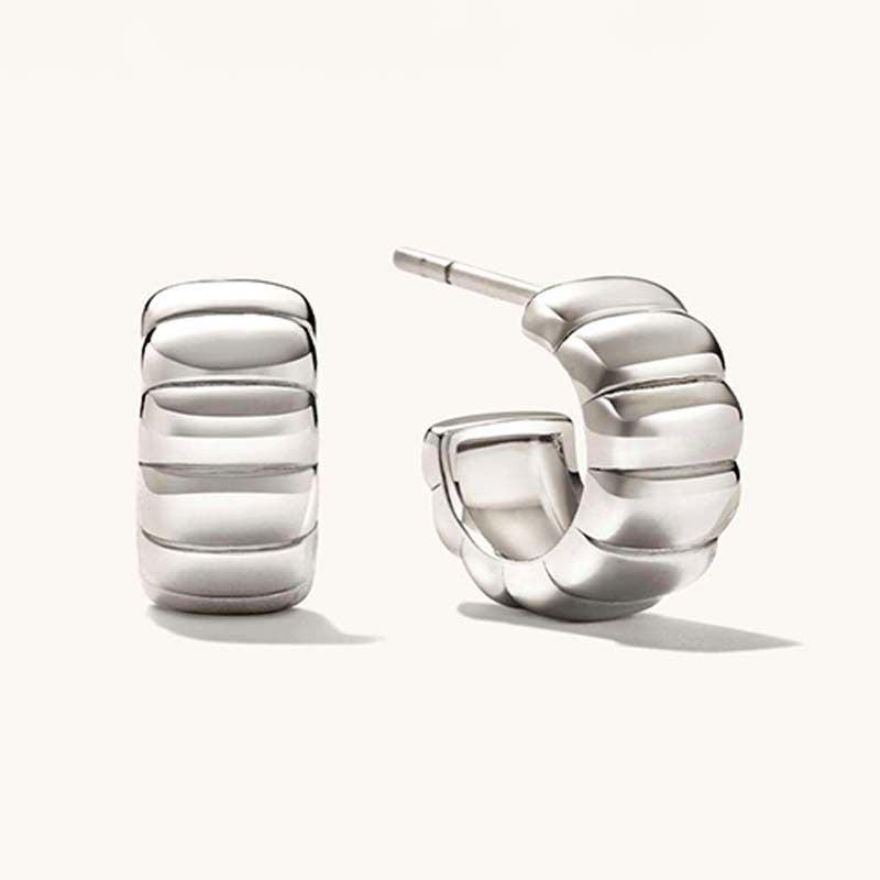 18K gold-plated, solid sterling silver C-shaped hoop earrings.