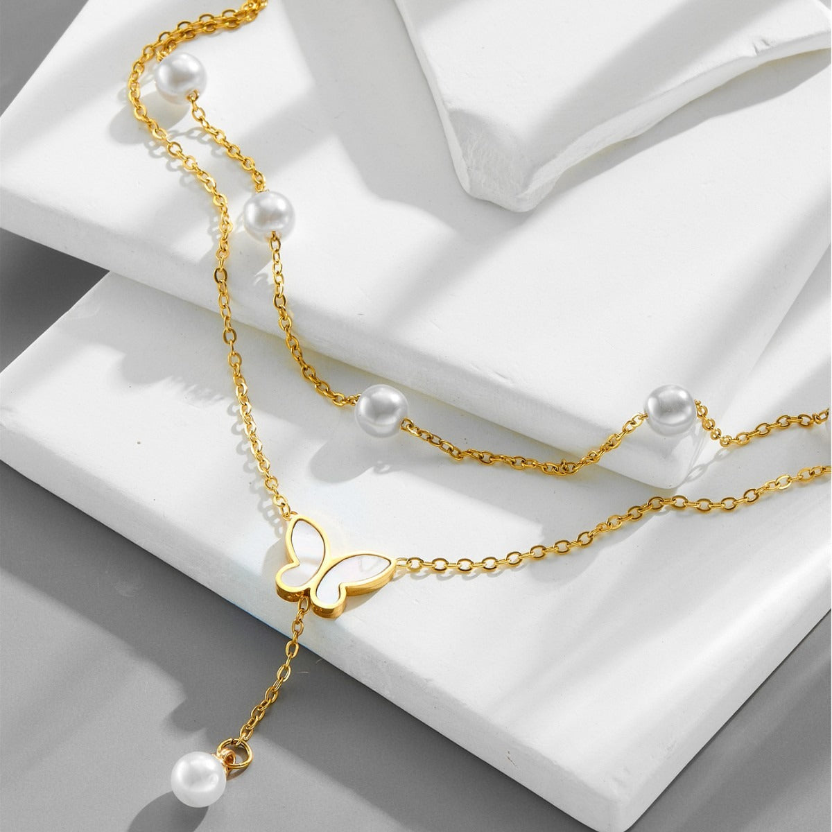 18k gold light luxury multi-layer stacked pearl butterfly tassel anklet