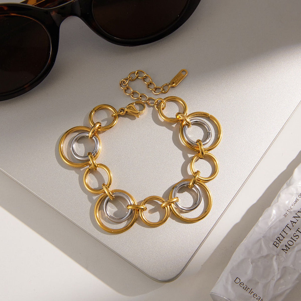 18K gold and S925 silver multi-strand bracelet with contrasting colors.
