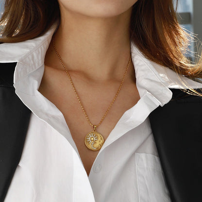 18K gold round necklace with sun and moon pattern and diamond design