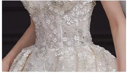 Luxury Off-Shoulder Wedding Dress - Handmade Lace Ball Gown | Femstylo