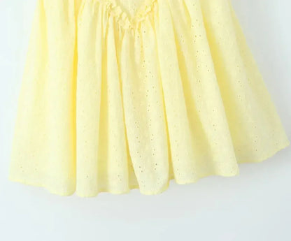 YENKYE Sexy Elegant Women Hollow Out Embroidery Yellow Sling Mini Dress Low Waist Lace Up Bandage Party Dresses Birthday Robe