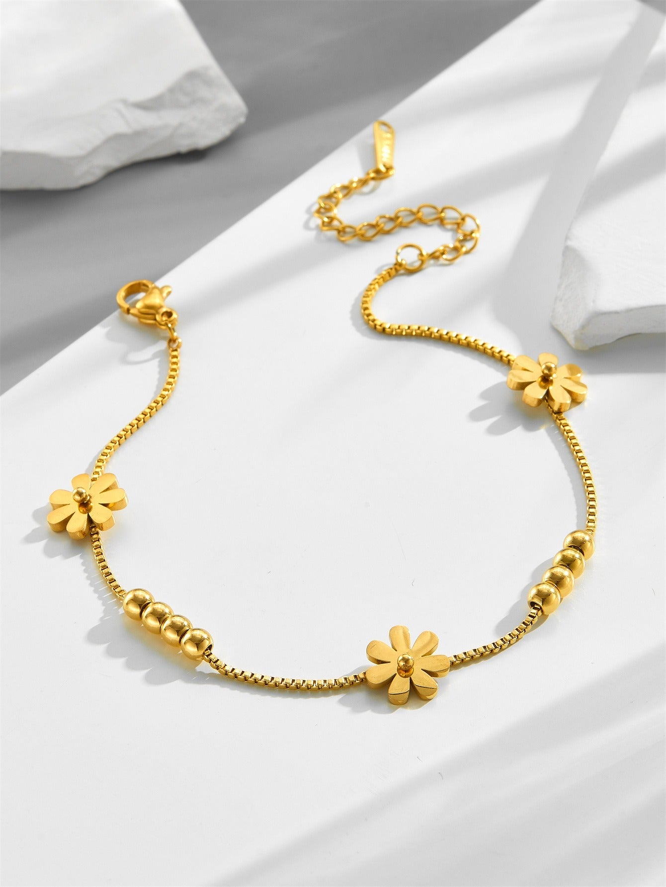 18k gold small daisy bean luck bead bracelet