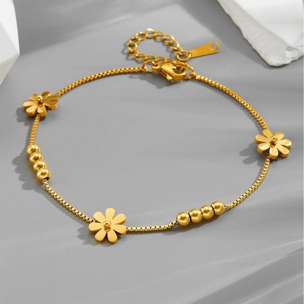 18k gold small daisy bean luck bead bracelet