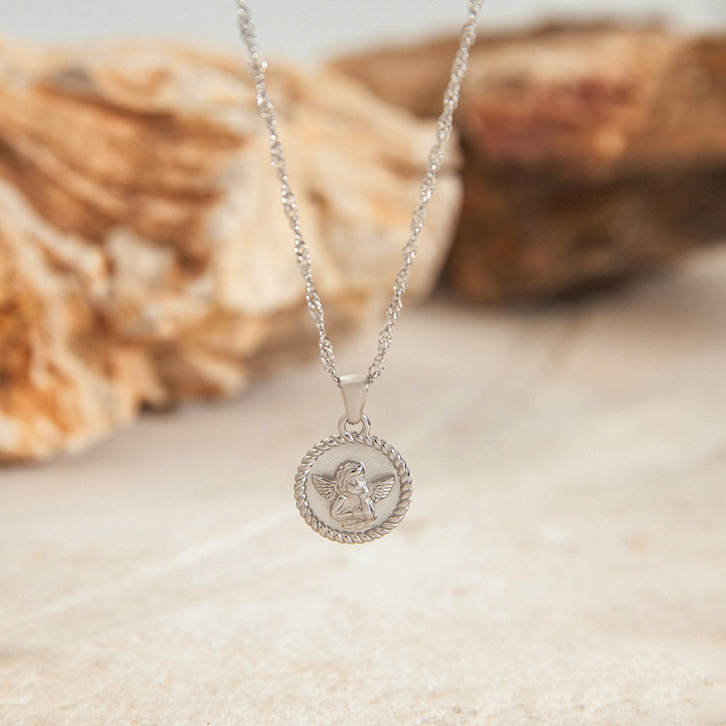 Round necklace with angel pattern design, classic and fashionable