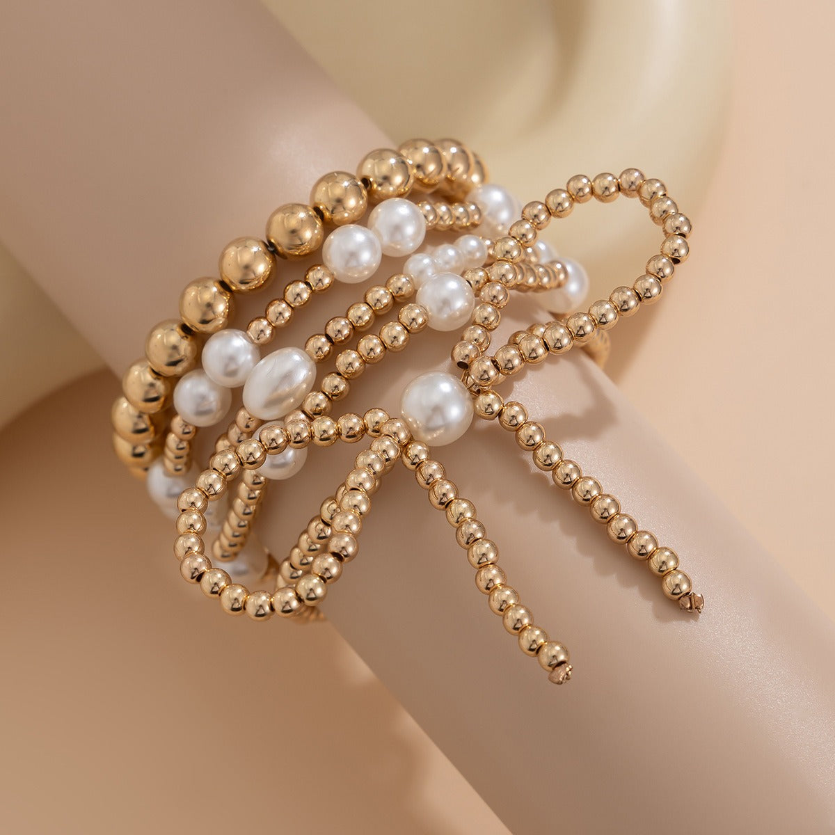 18k gold bow pearl beaded bracelet