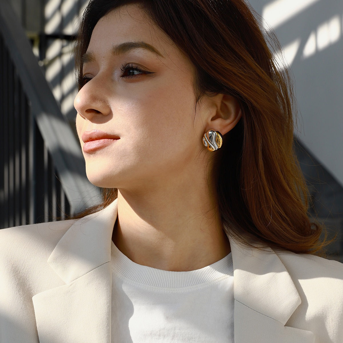 18k gold geometric shape with gold and silver color matching design fashionable and personalized earrings