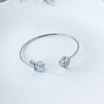 18K gold open-design smooth bangle bracelet