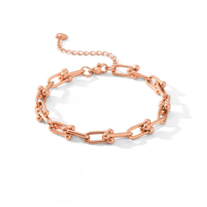 18k gold horseshoe chain bracelet and earrings