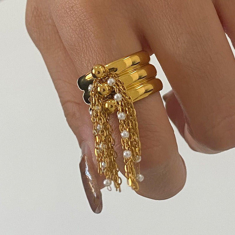 18K gold multi-layered ring with tassel design