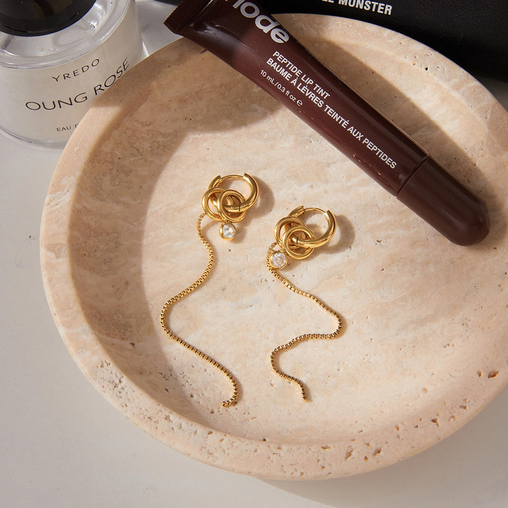18K gold lightweight luxury tassel earrings with cubic zirconia.