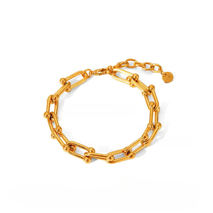18k gold horseshoe chain bracelet and earrings
